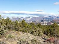 Aubignosc - Forêt domaniale  Vue vers l'Est. De gauche à droite : La Baume, la barre de Gache, la montagne St Michel et tout à droite au second plan, Jouère et les Monges