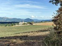 Les Romeyères  Ferme des Damians. Au loin à gauche, la montagne de Gache (1357 m). Au centre celle de la Baume